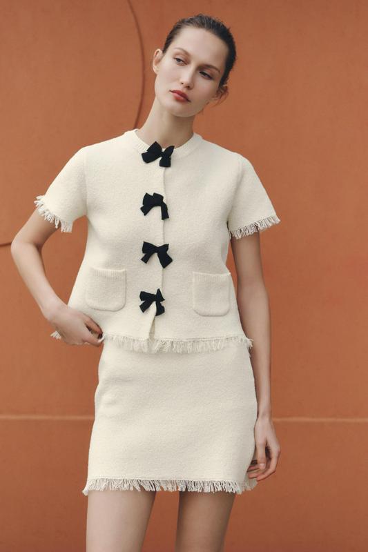 FRAYED KNIT MINI SKIRT