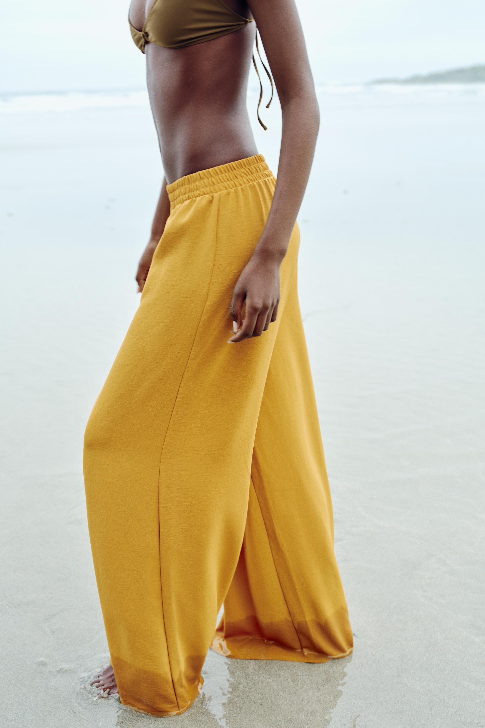 FLOWING PALAZZO TROUSERS