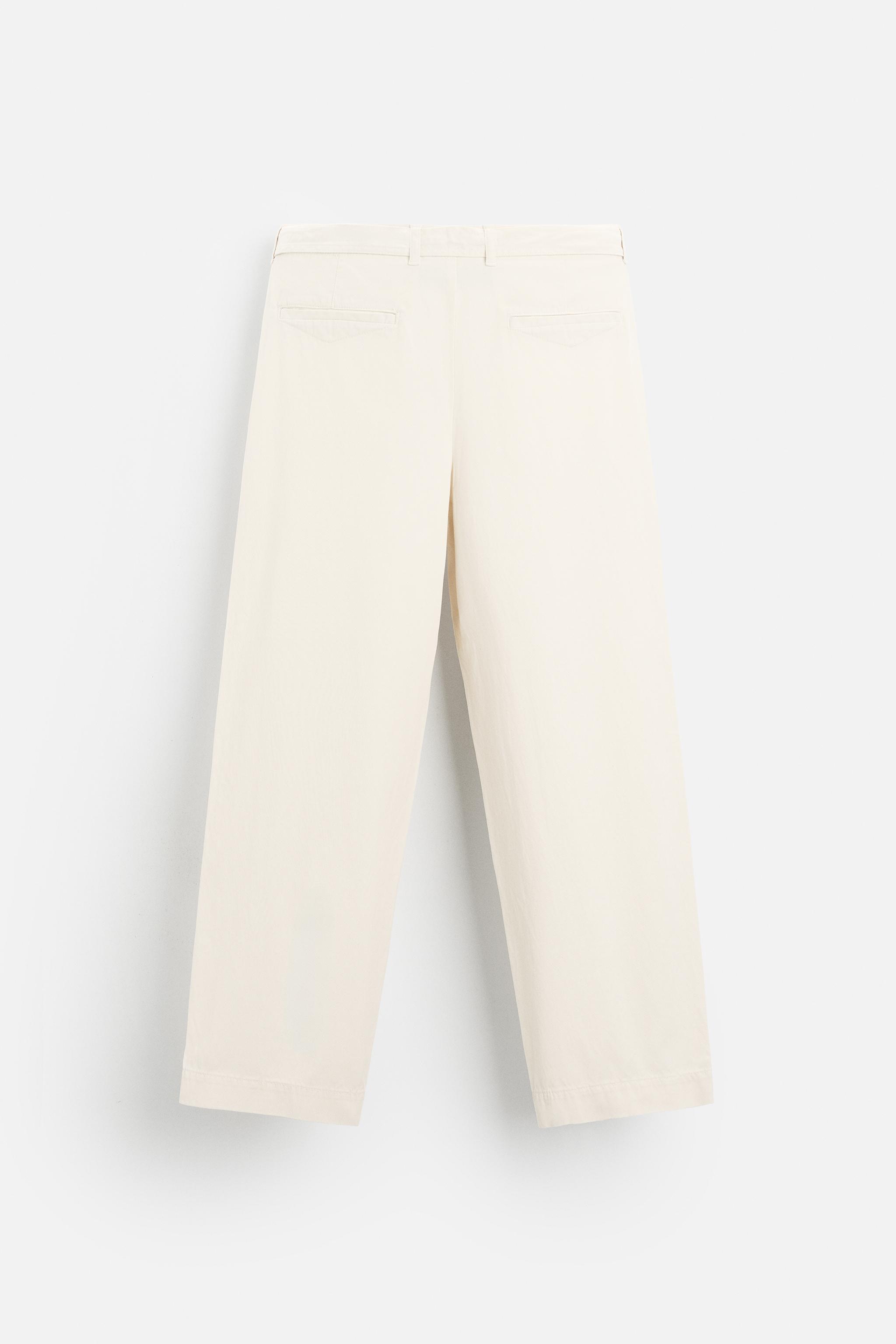 TEXTURED TROUSERS WITH BELT