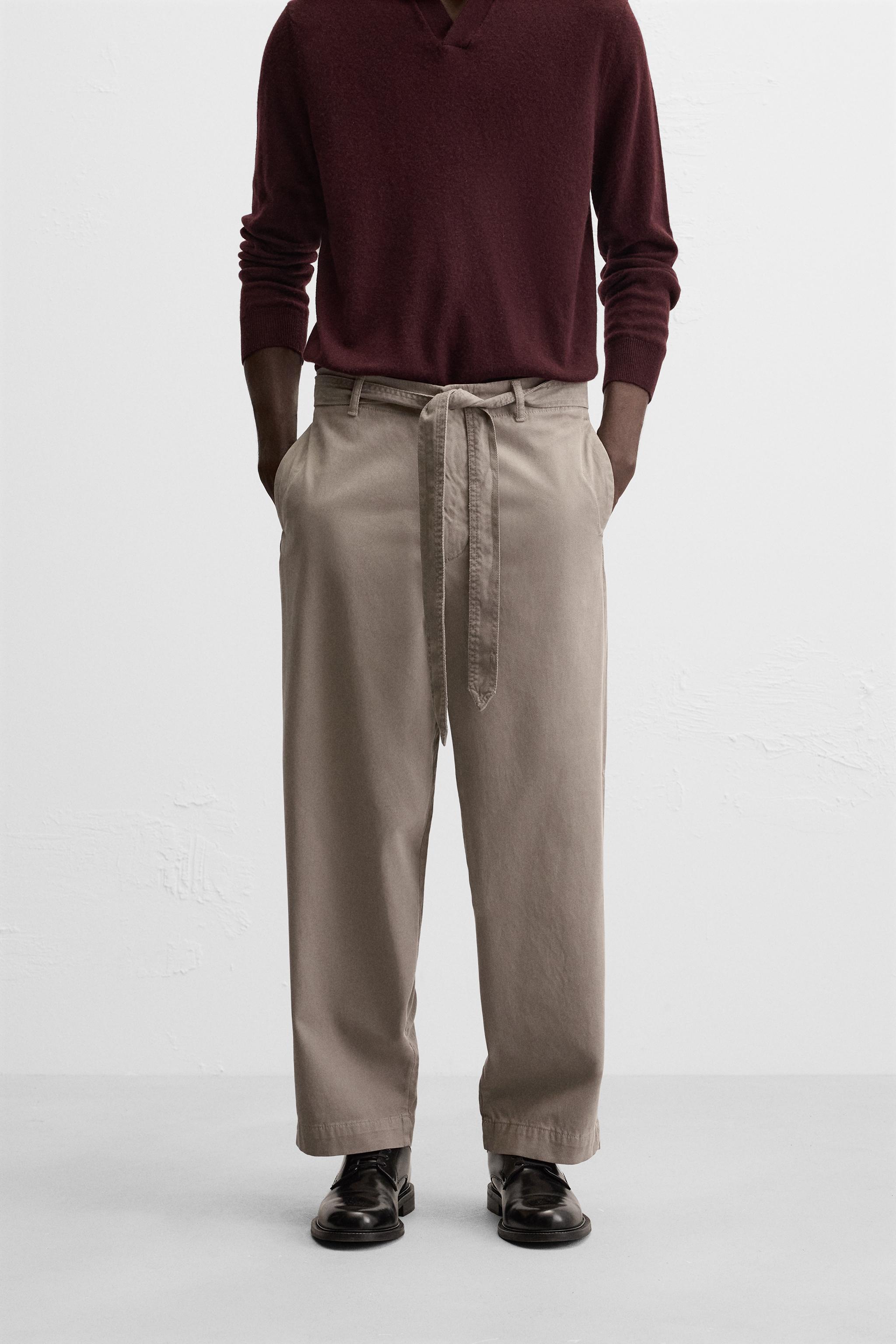 TEXTURED TROUSERS WITH BELT