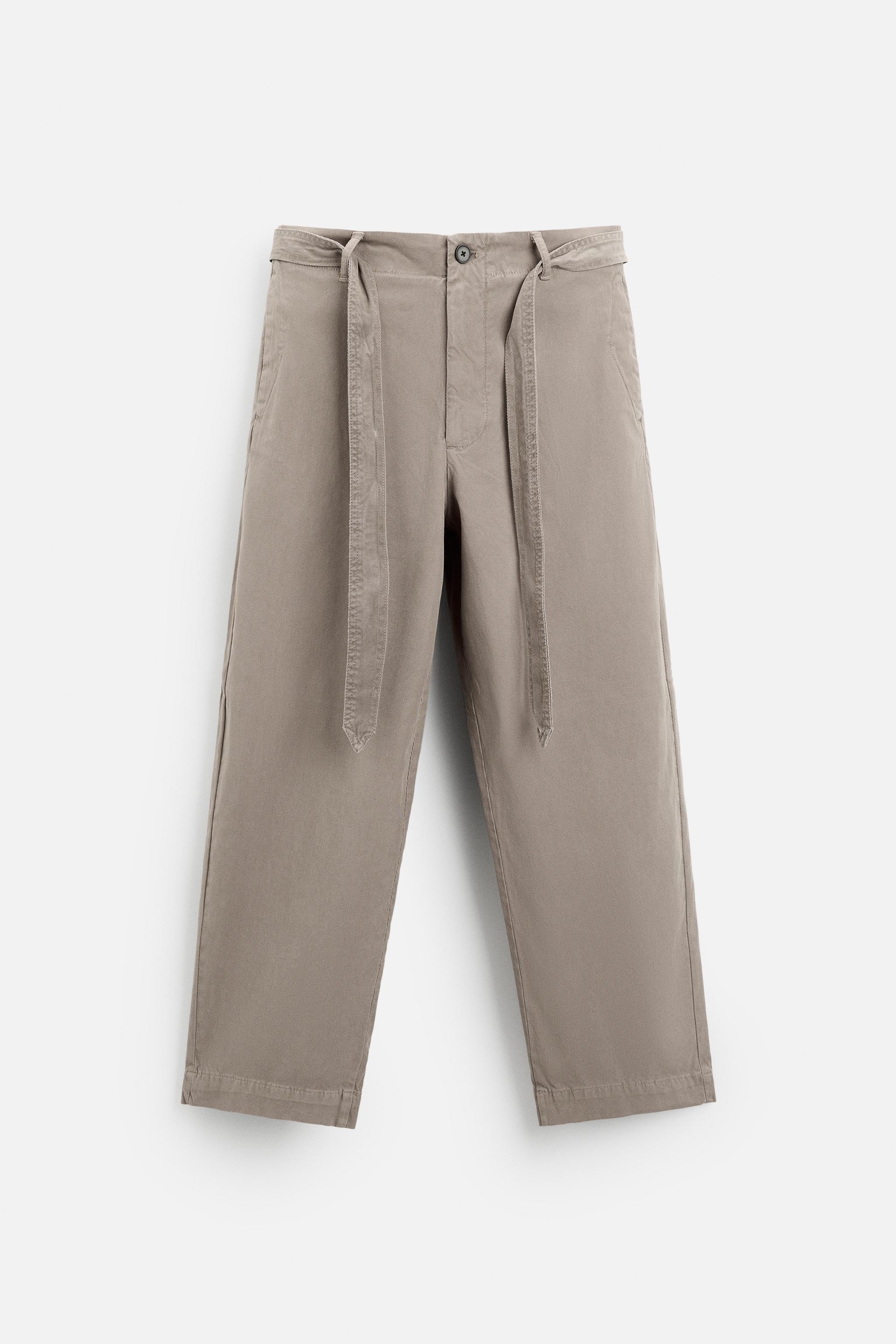 TEXTURED TROUSERS WITH BELT