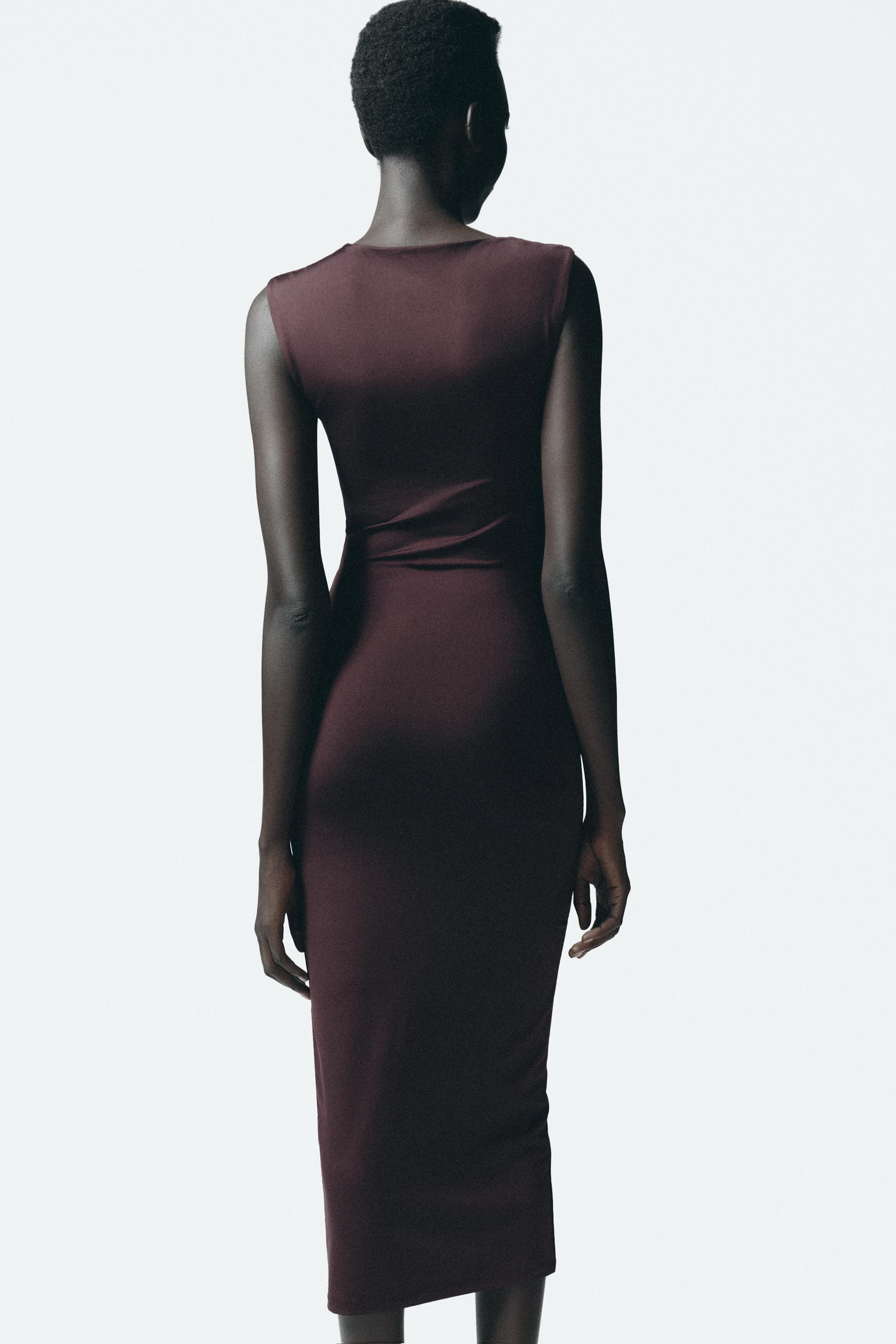 DRESS WITH METAL APPLIQUÉ