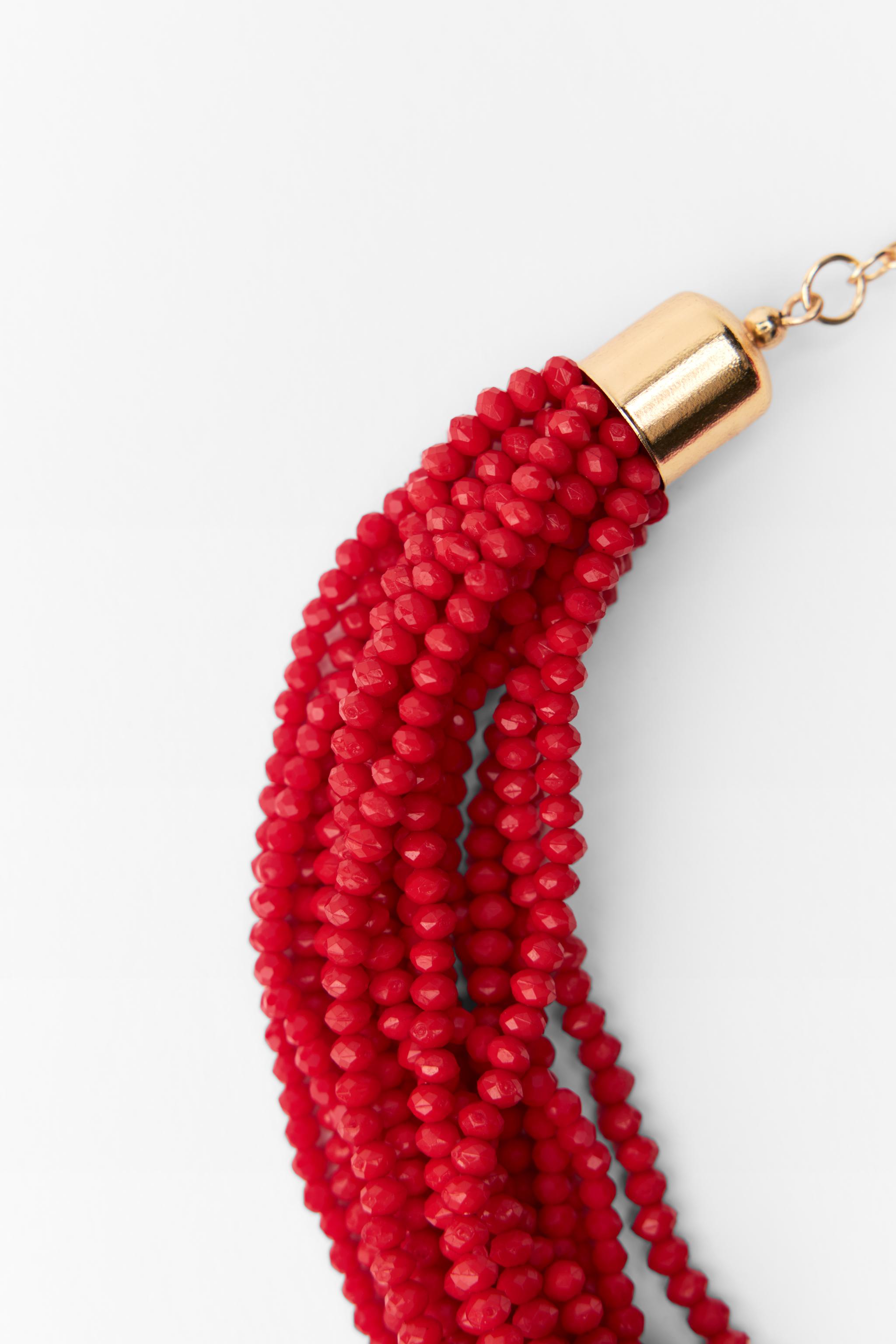 CASCADING NECKLACE WITH BEADS