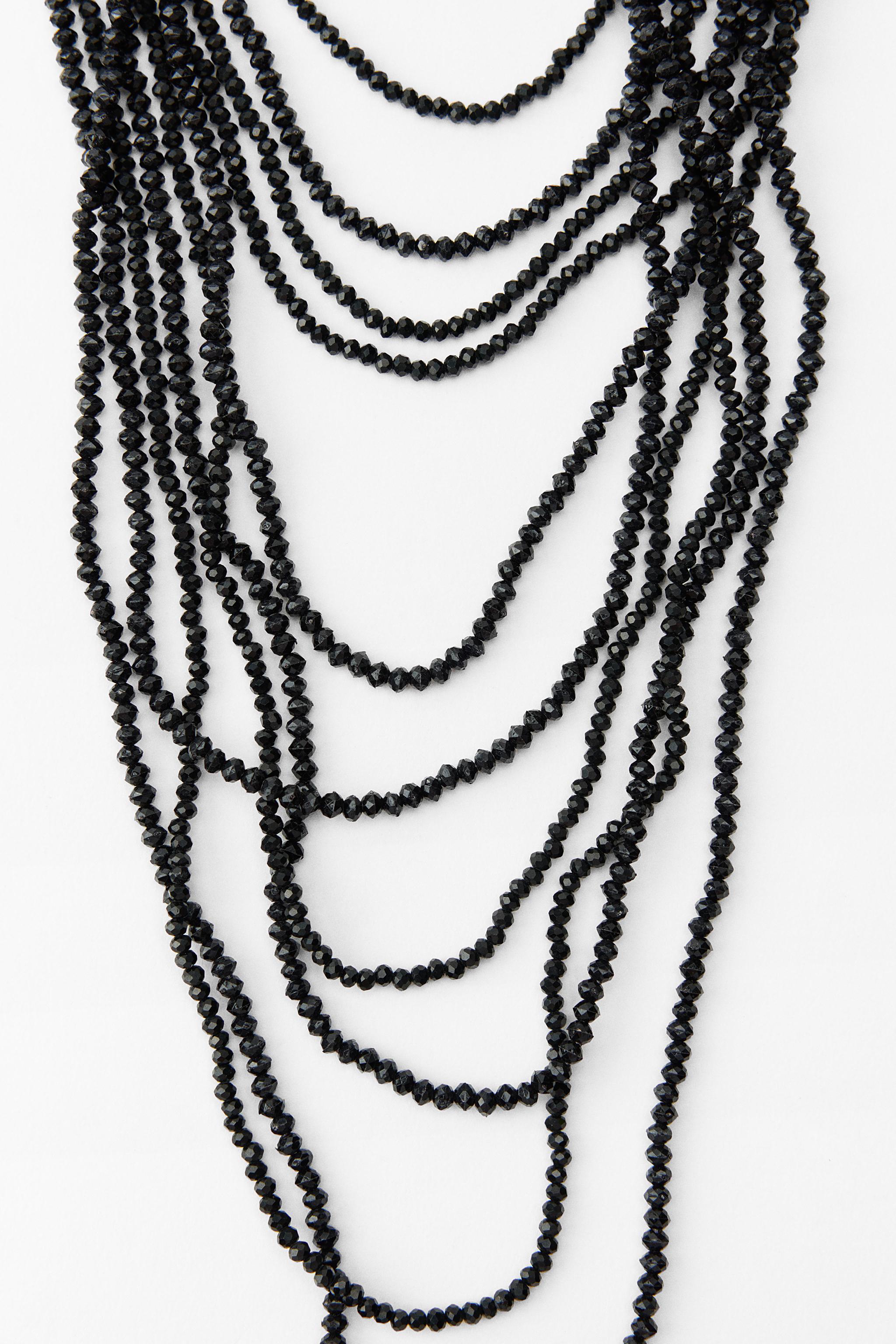 CASCADING NECKLACE WITH BEADS