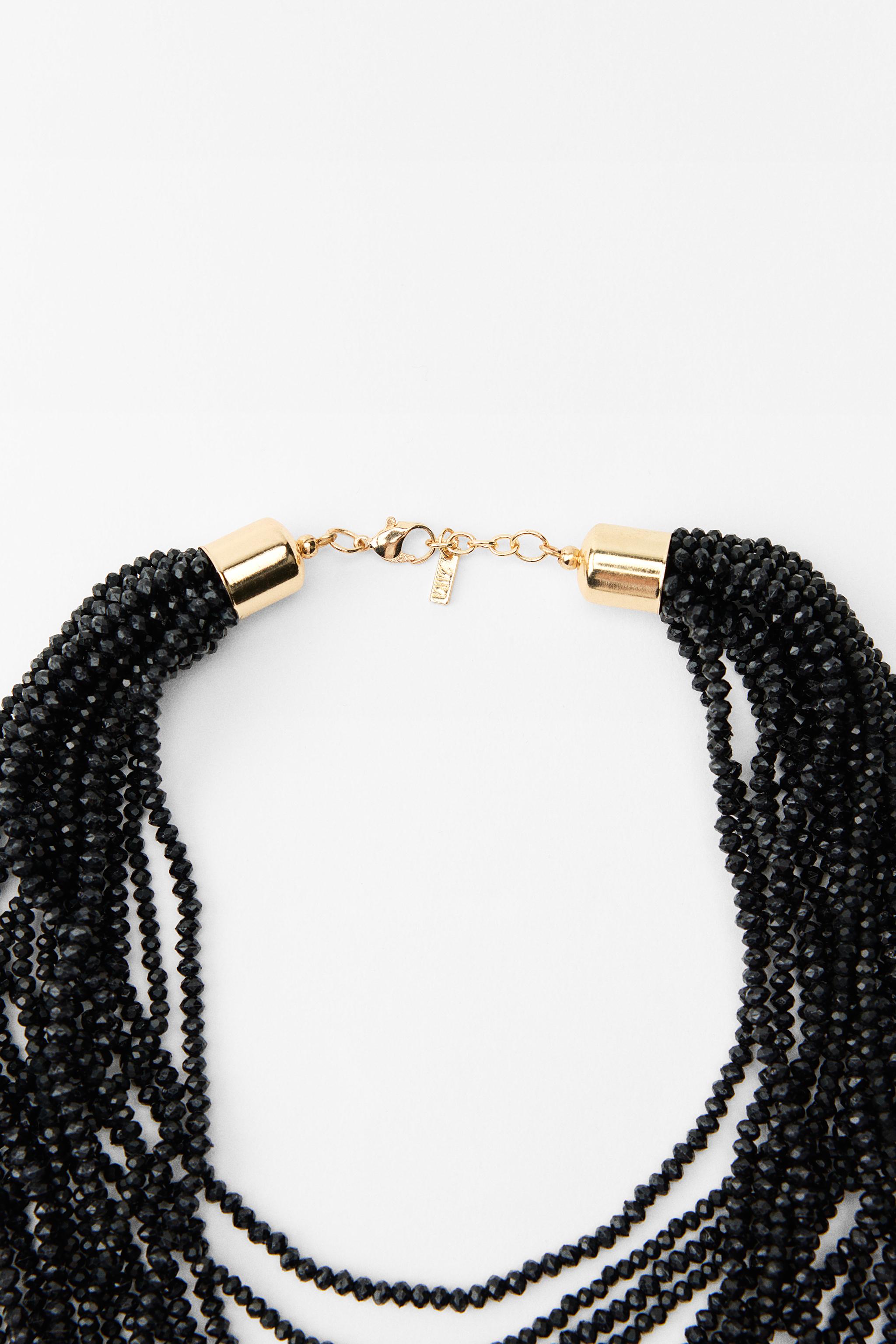 CASCADING NECKLACE WITH BEADS