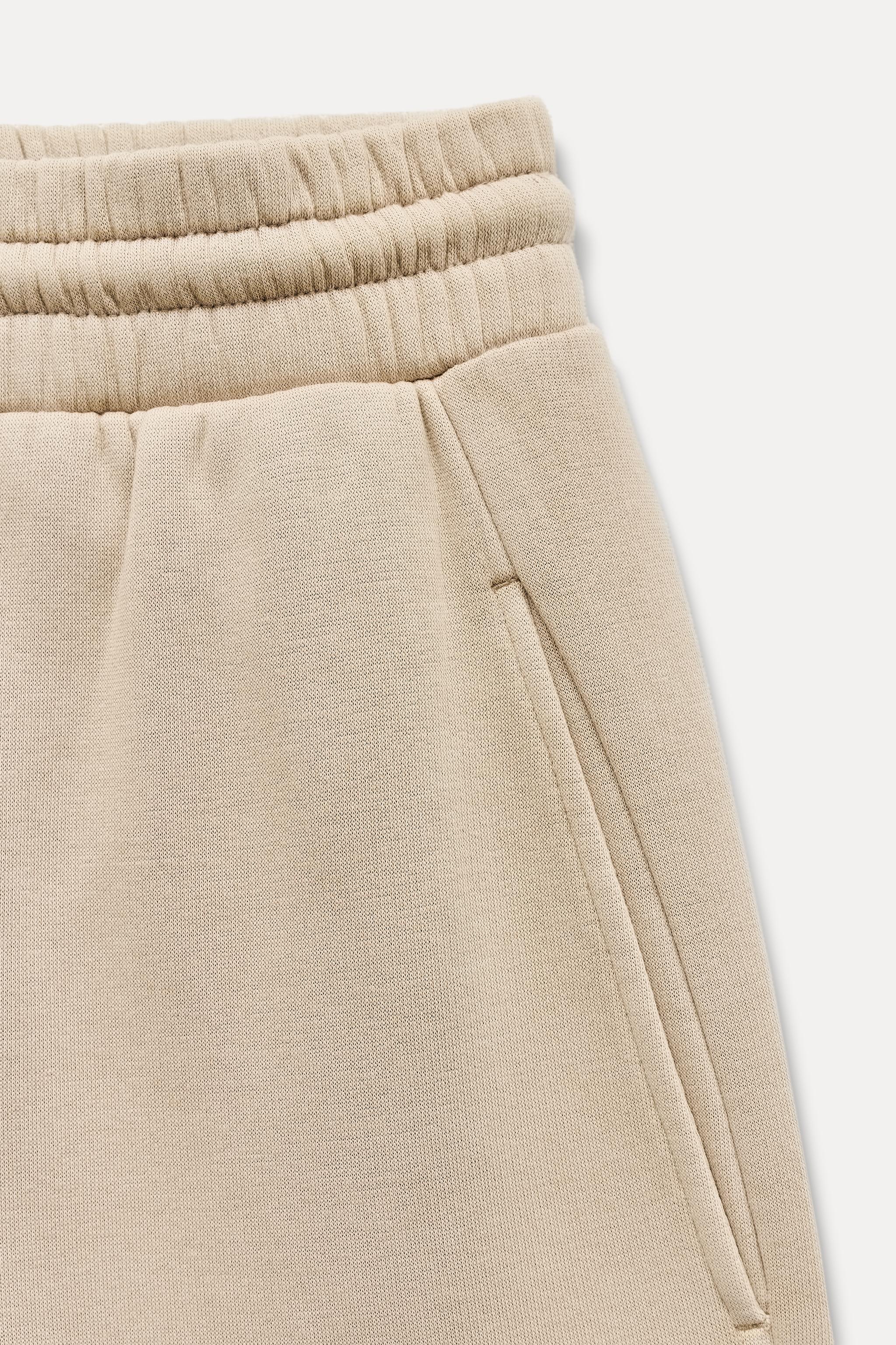 FADED WIDE-LEG TROUSERS