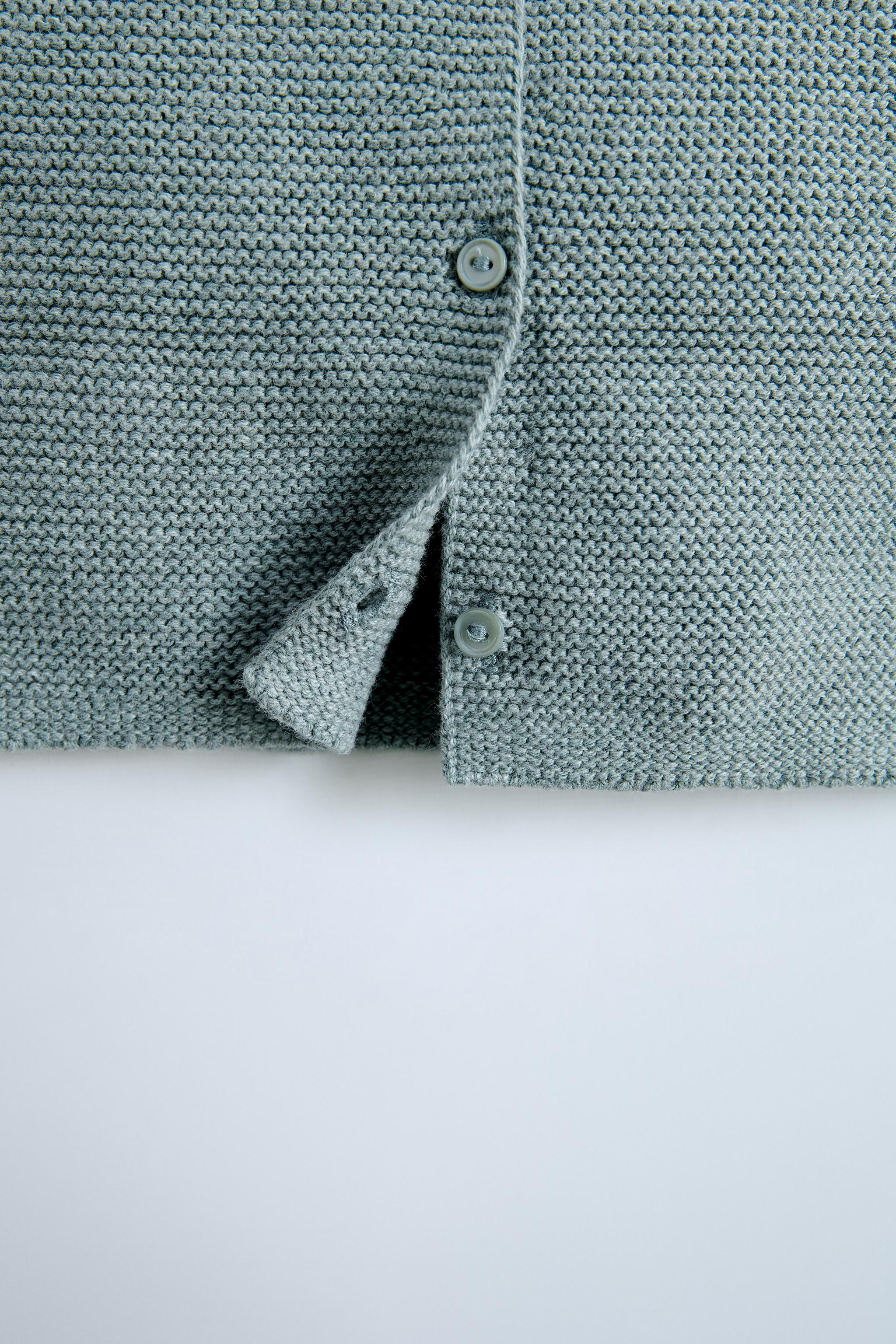 KNIT SWEATER WITH POCKET