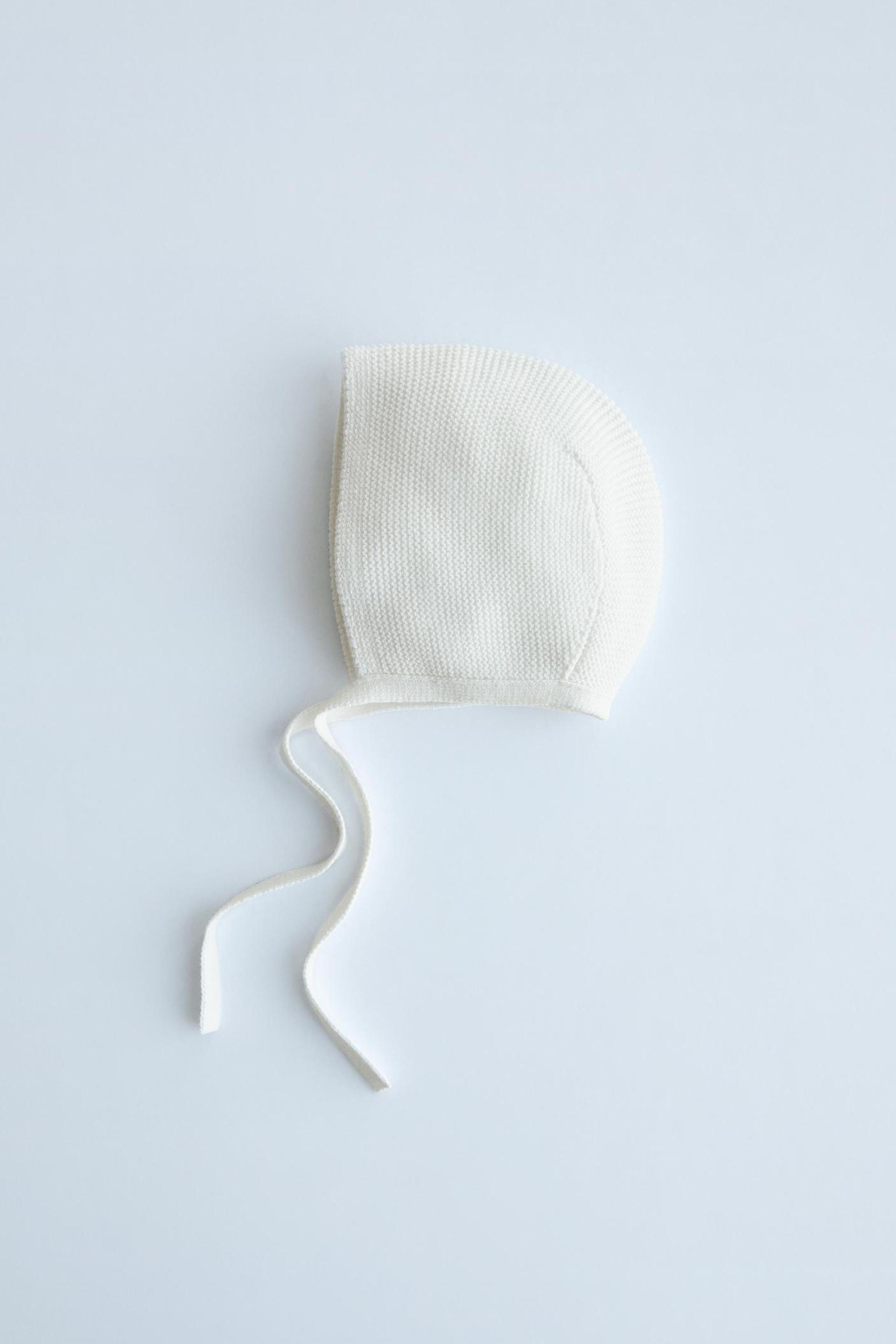 CABLE-KNIT BONNET