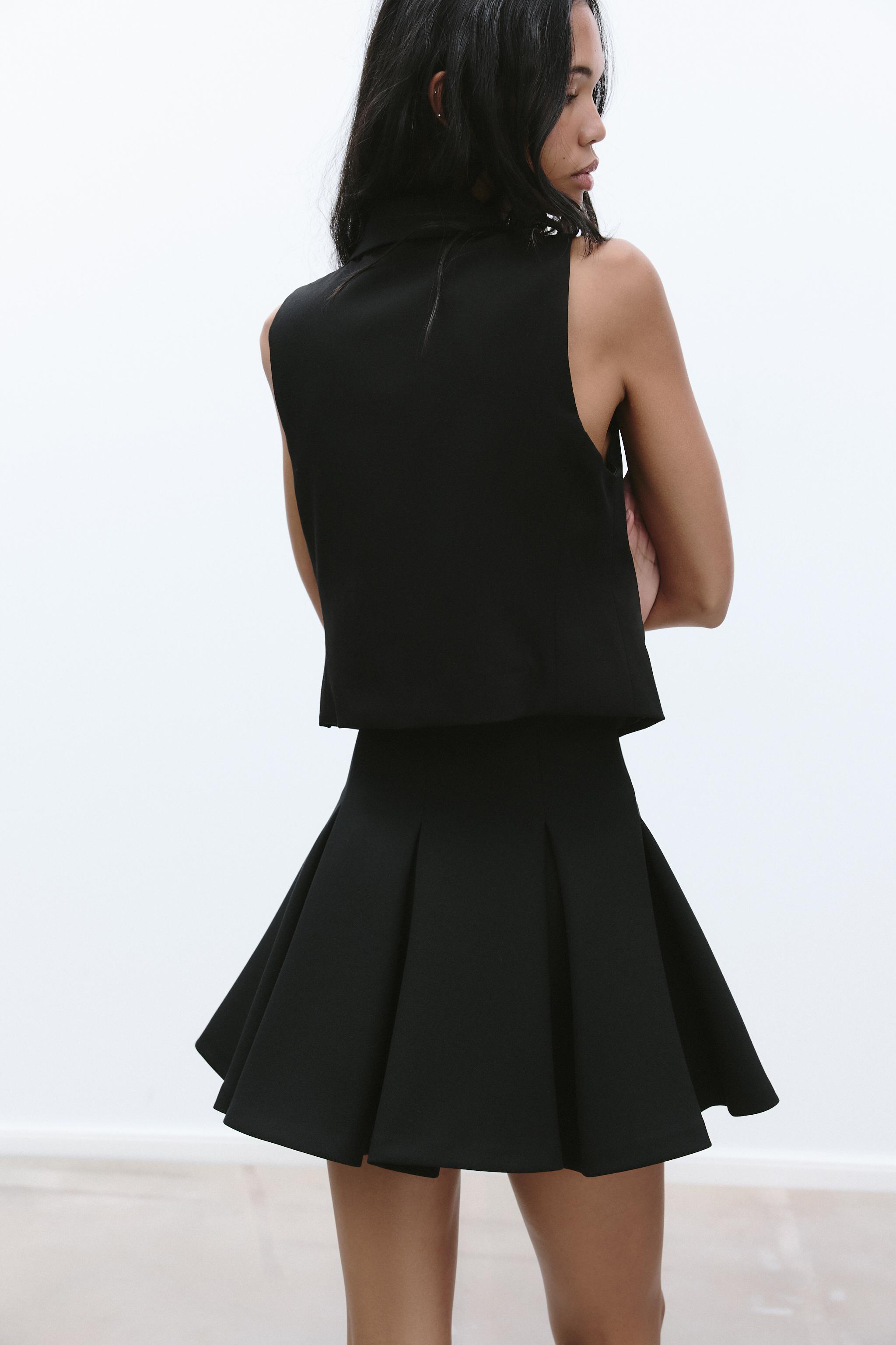 VOLUMINOUS MINI SKIRT