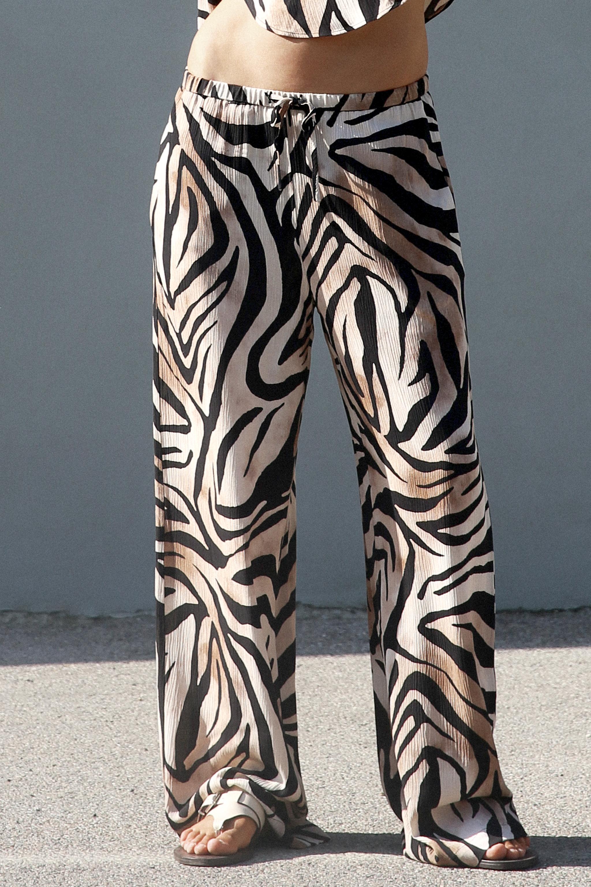 ANIMAL PRINT WIDE-LEG TROUSERS