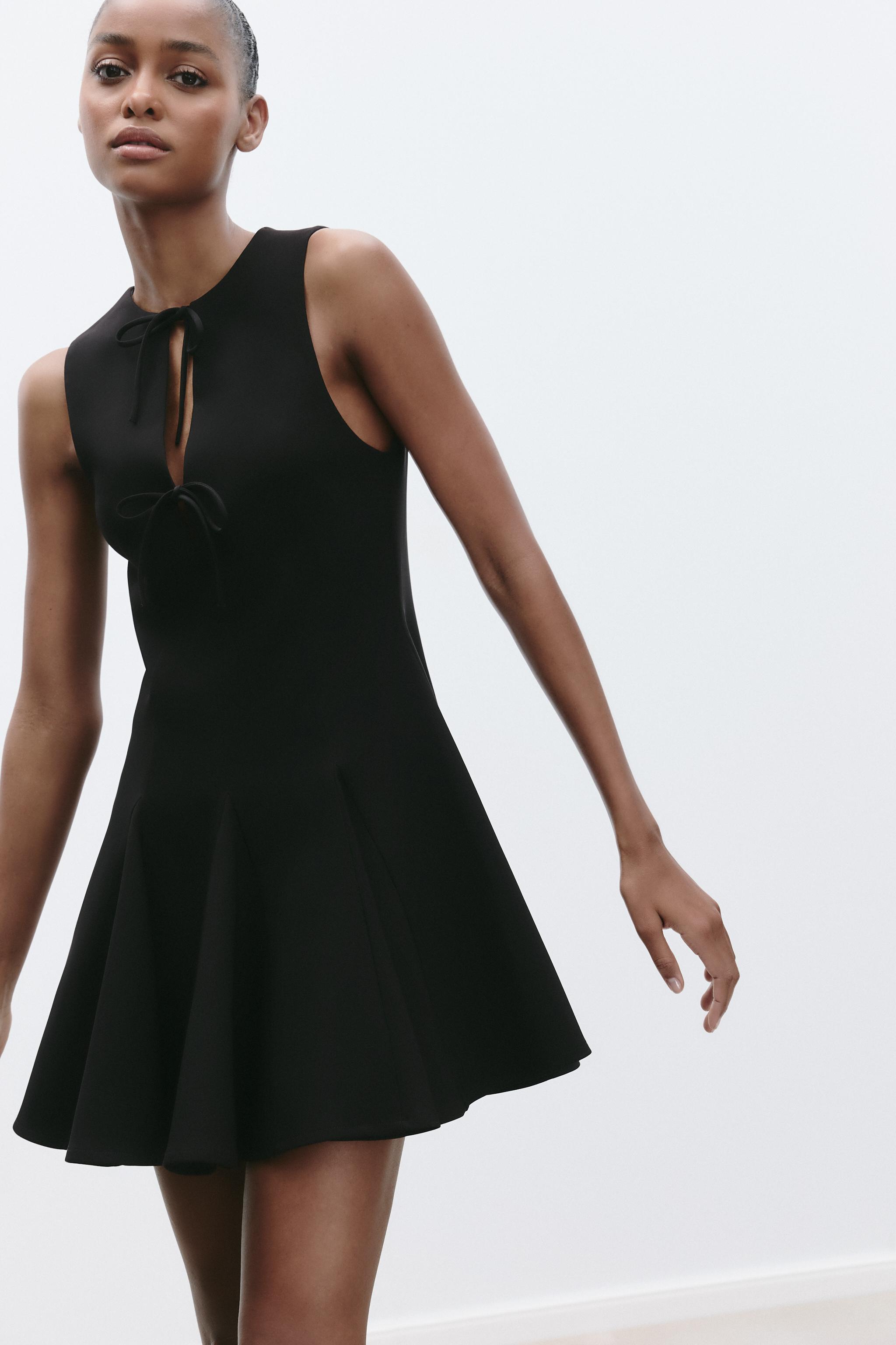SHORT DRESS WITH BOWS AND GODET HEM
