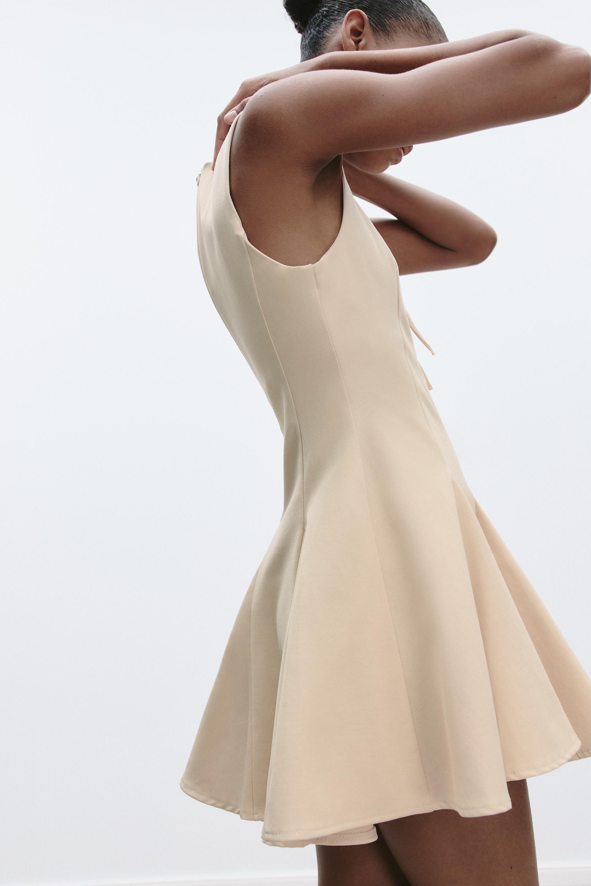 SHORT DRESS WITH BOWS AND GODET HEM