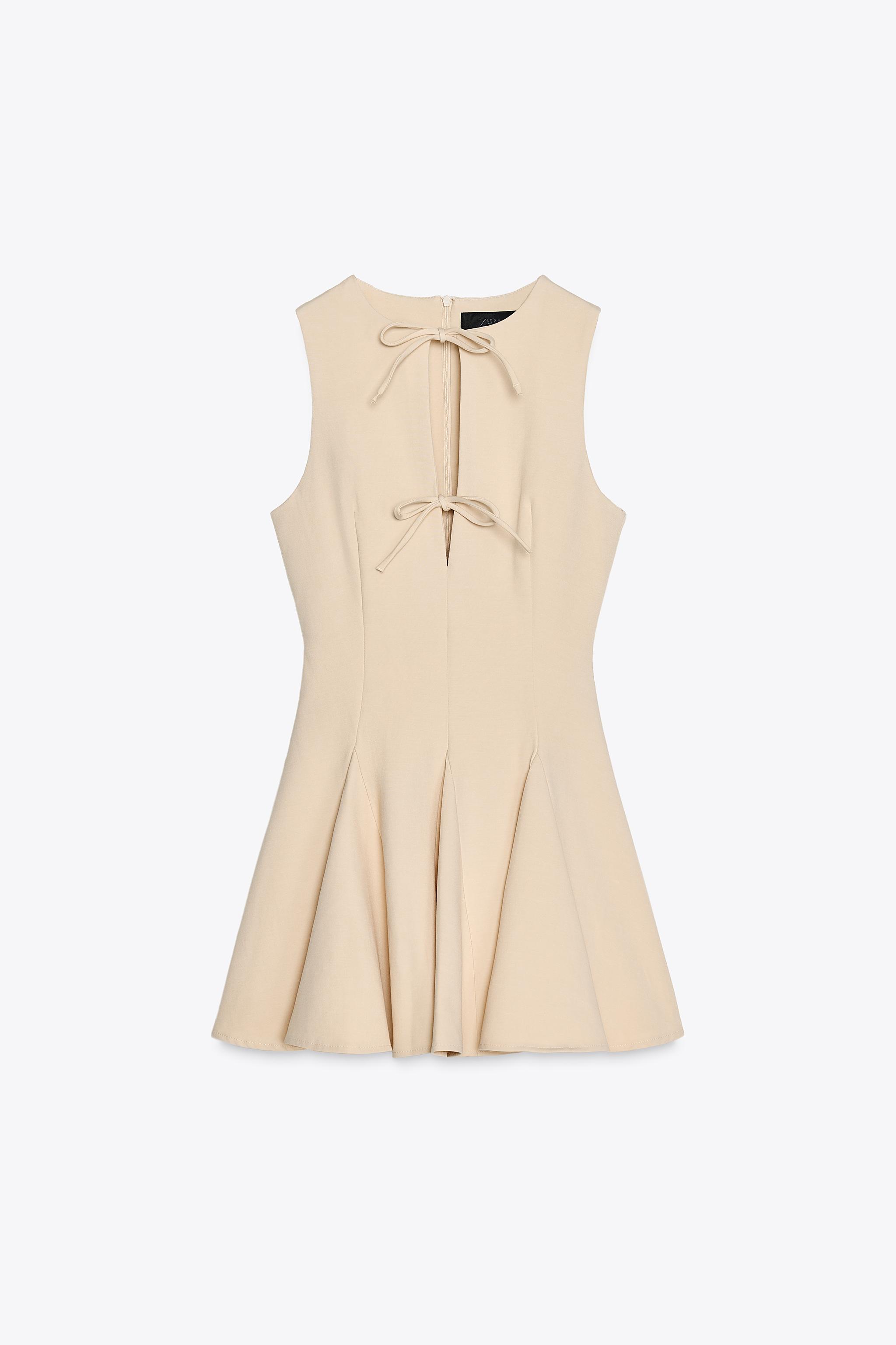 SHORT DRESS WITH BOWS AND GODET HEM