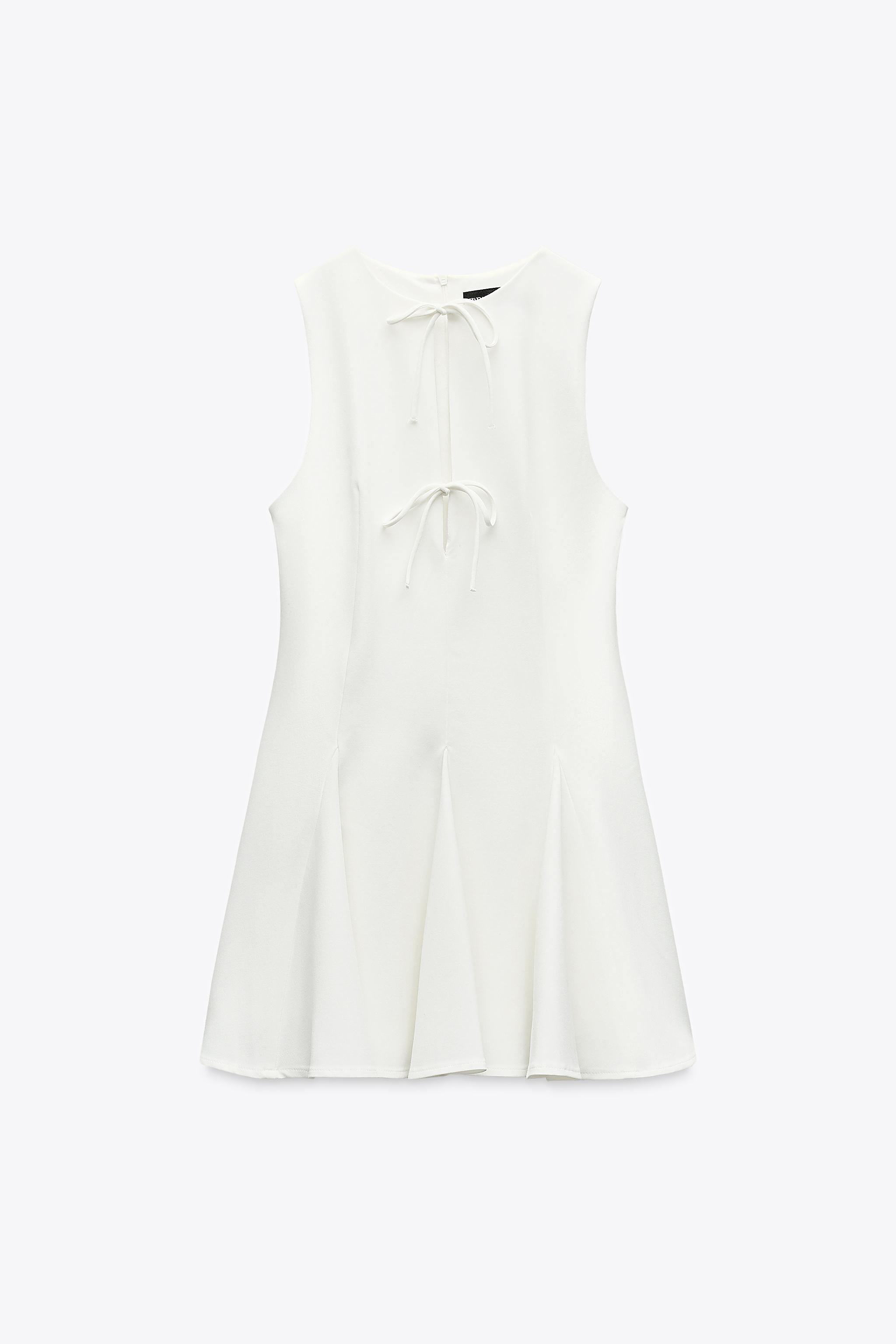 SHORT DRESS WITH BOWS AND GODET HEM