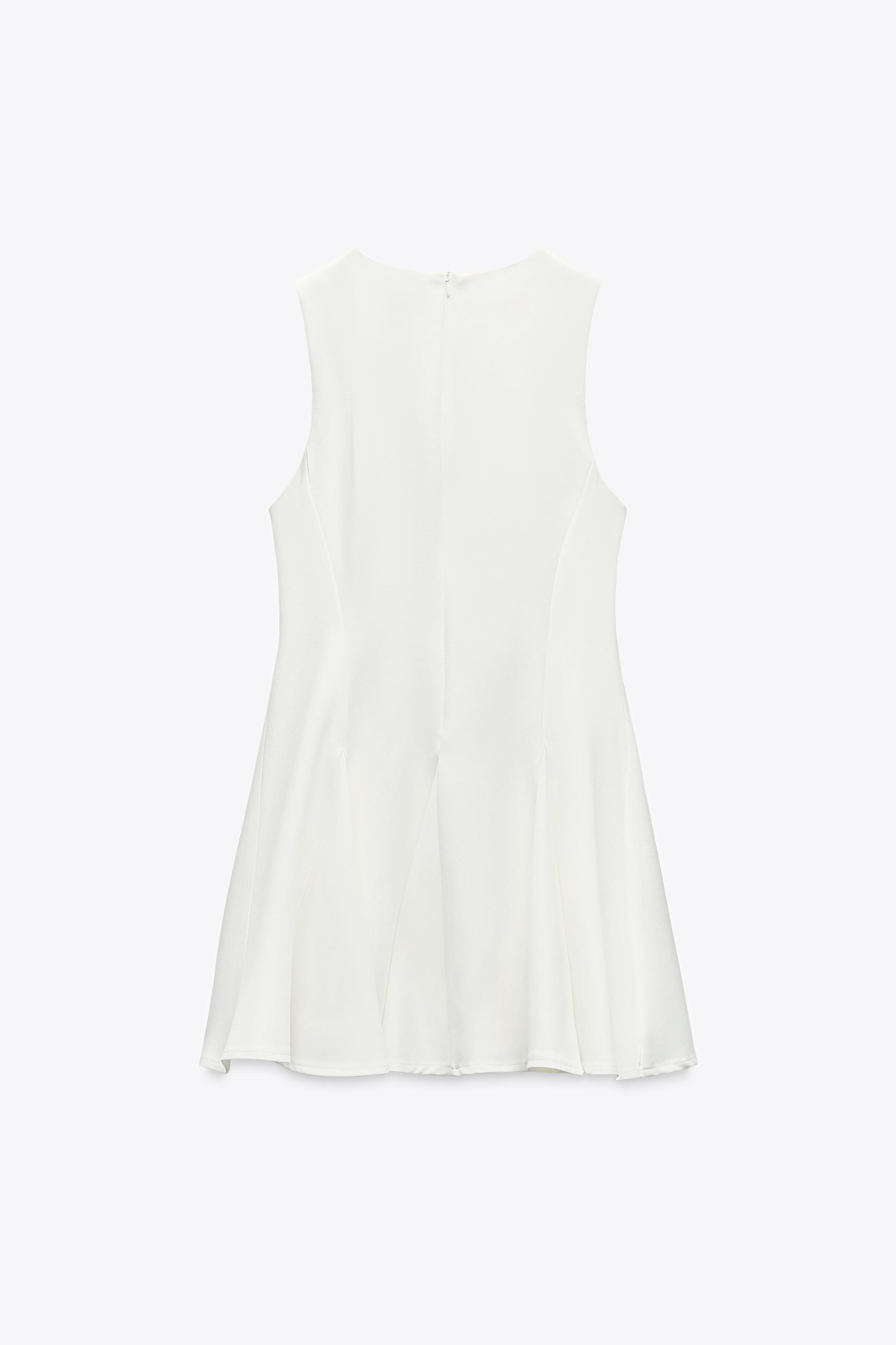 SHORT DRESS WITH BOWS AND GODET HEM
