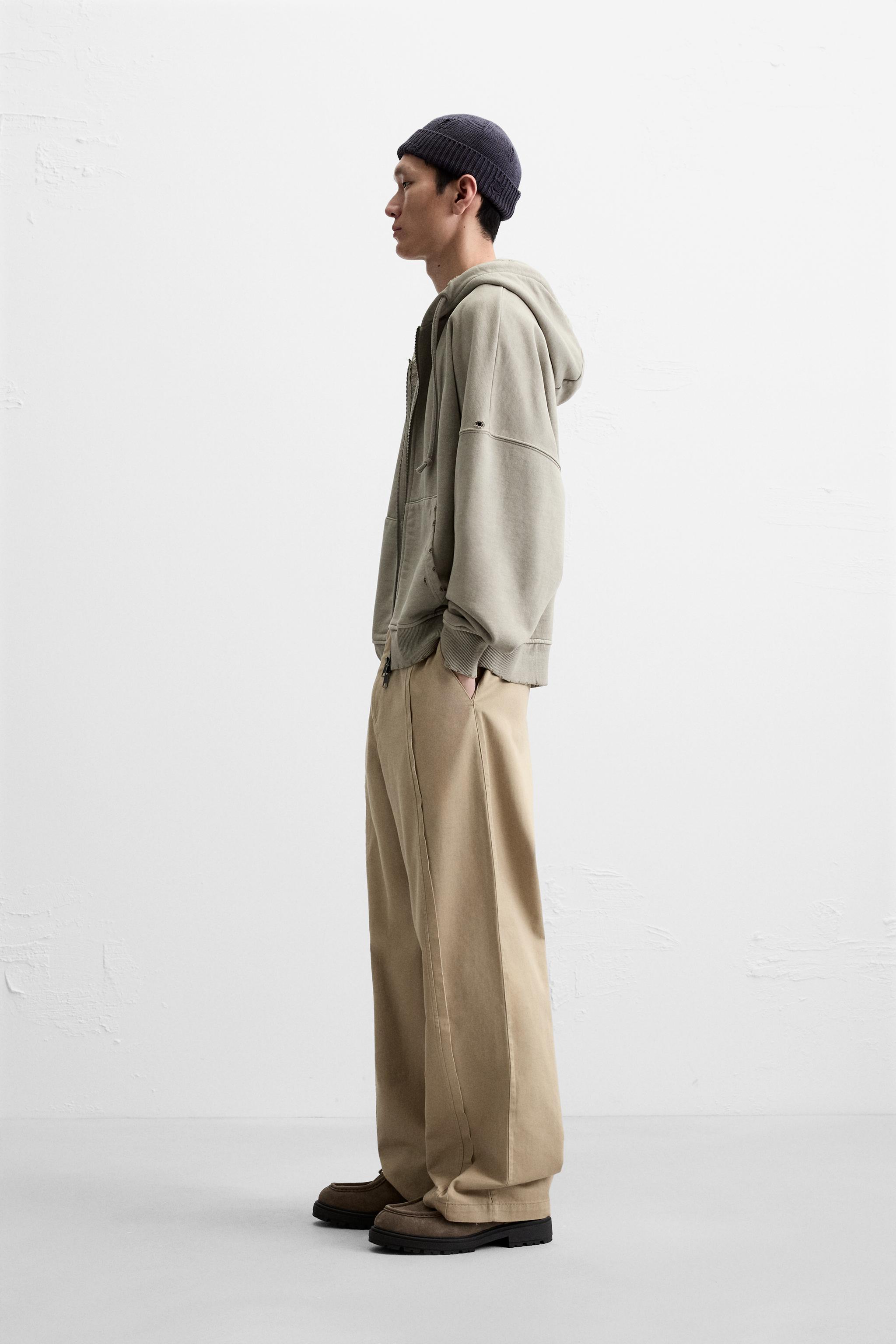 RELAXED FIT TROUSERS WITH CONTRAST STITCHING