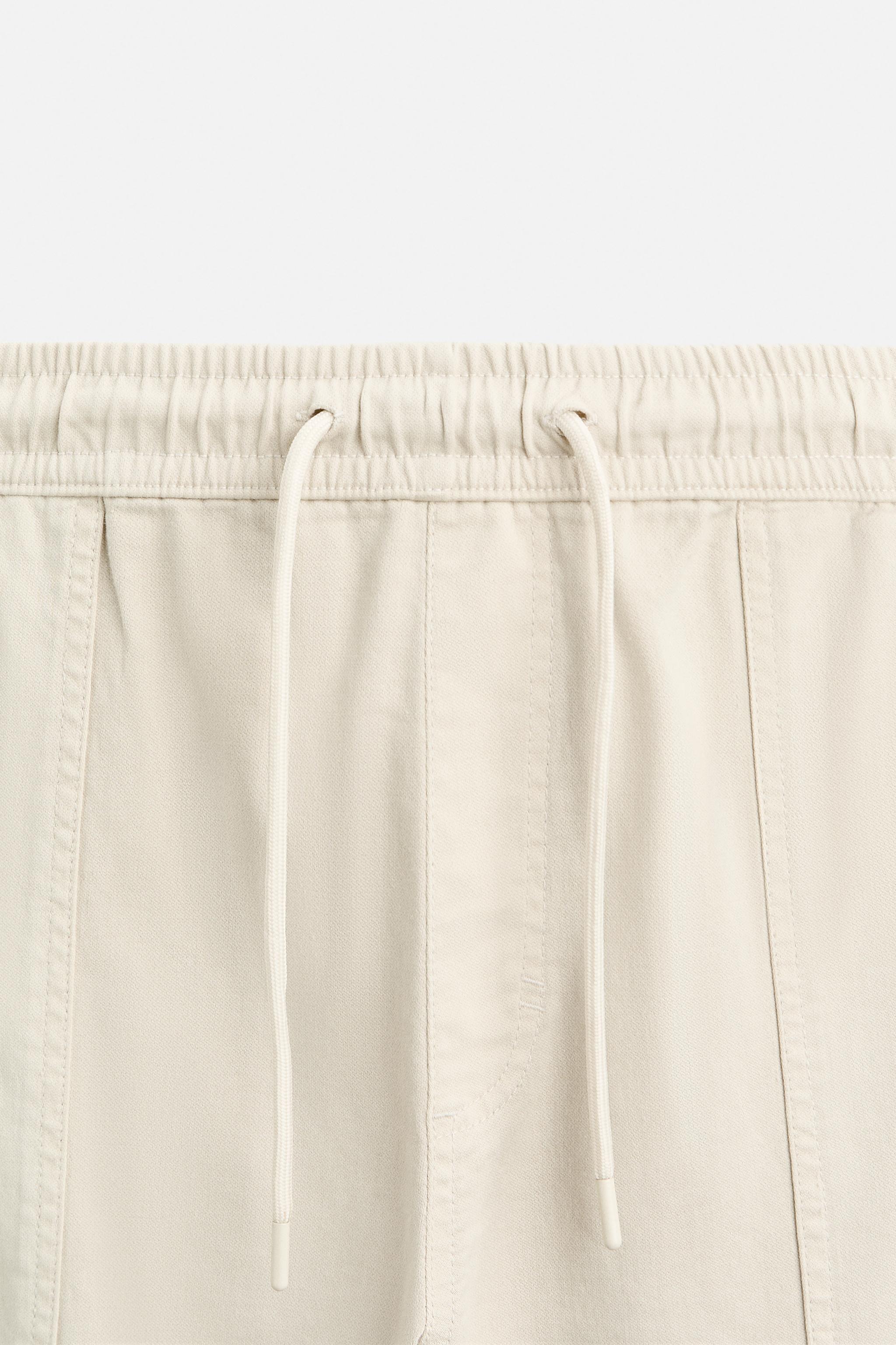 CARGO TROUSERS WITH POCKETS