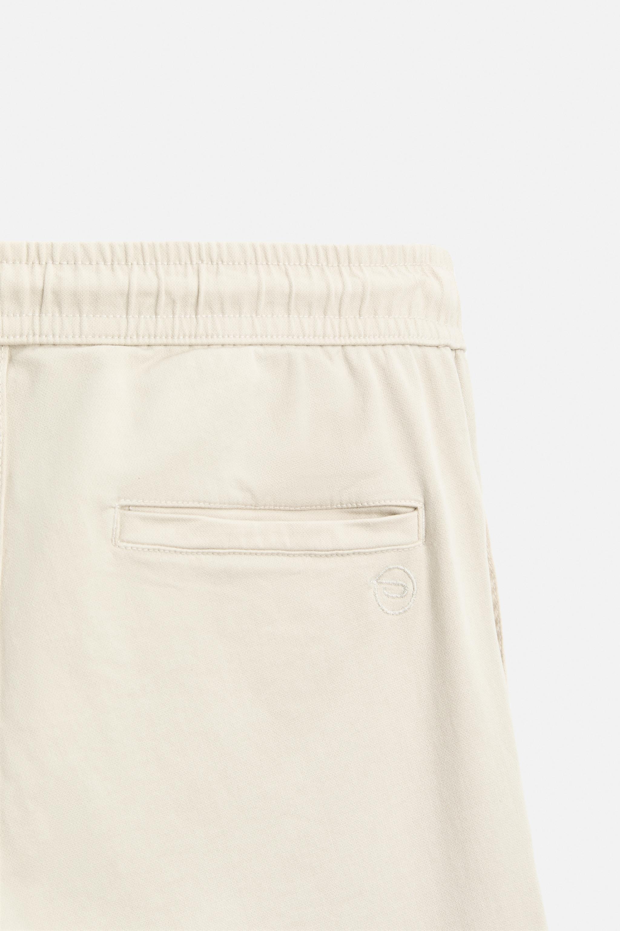 CARGO TROUSERS WITH POCKETS