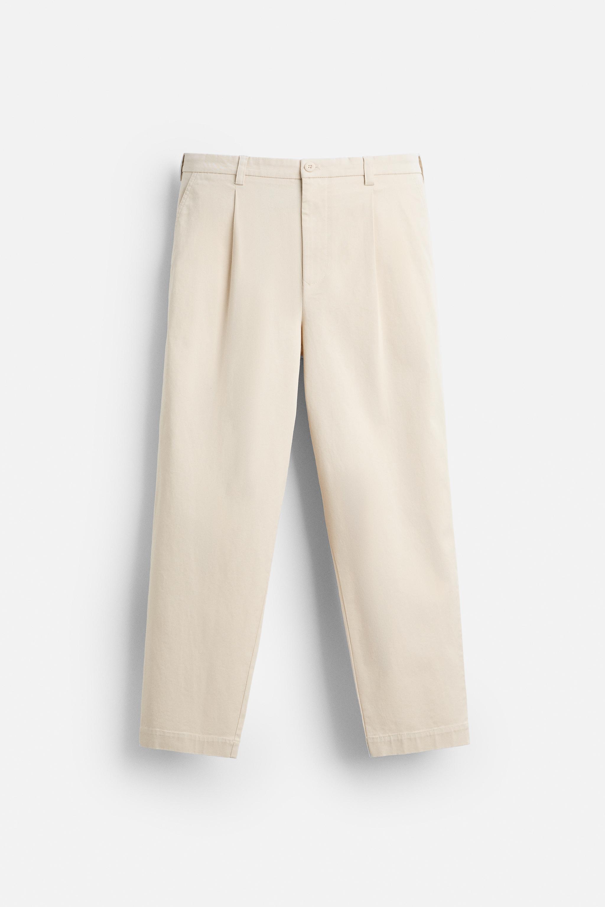 PLEATED TROUSERS