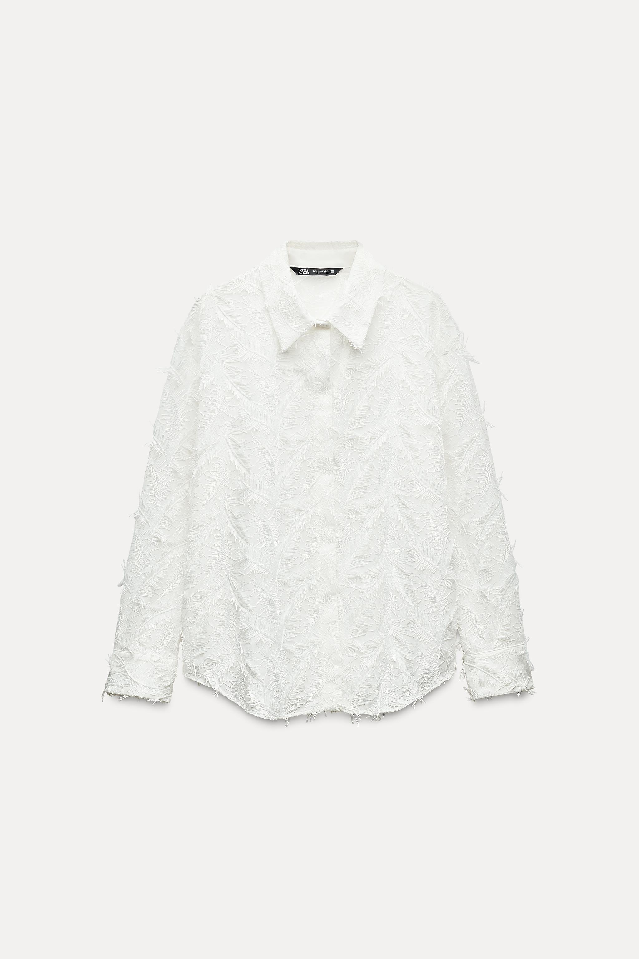 SHIRT WITH FRINGED TRIMS