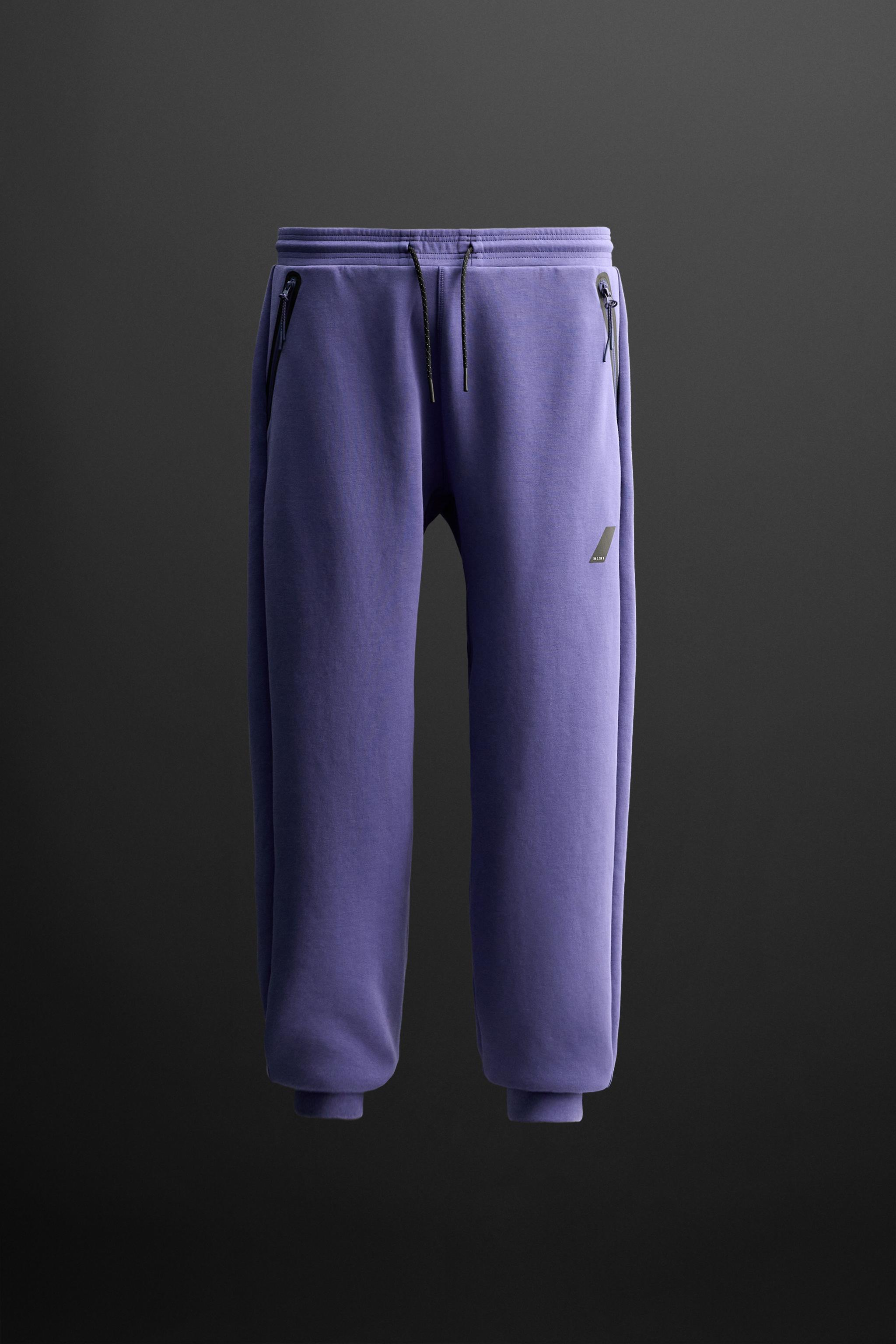 TECHNICAL JOGGERS WITH ZIPS