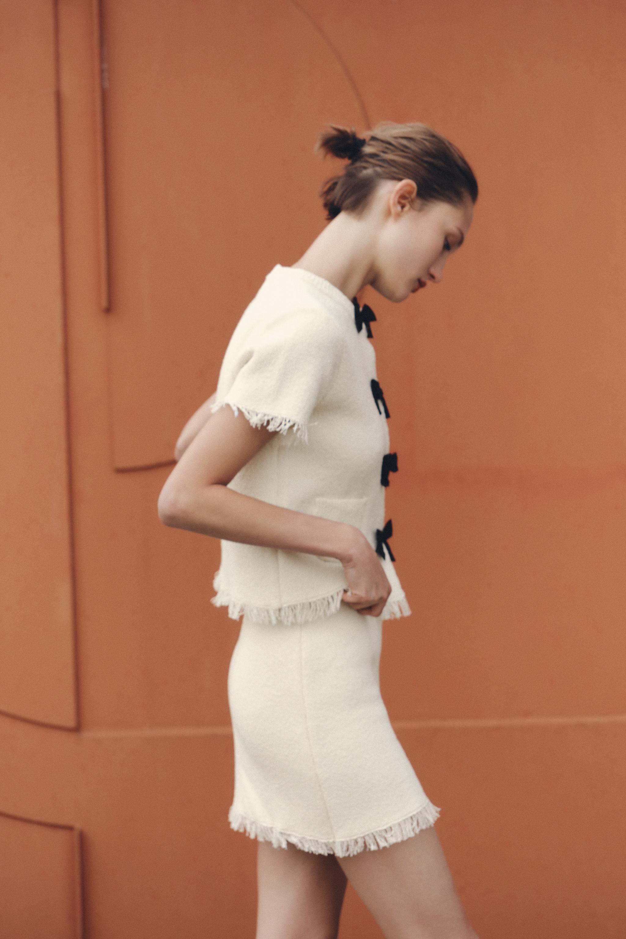 FRAYED KNIT MINI SKIRT
