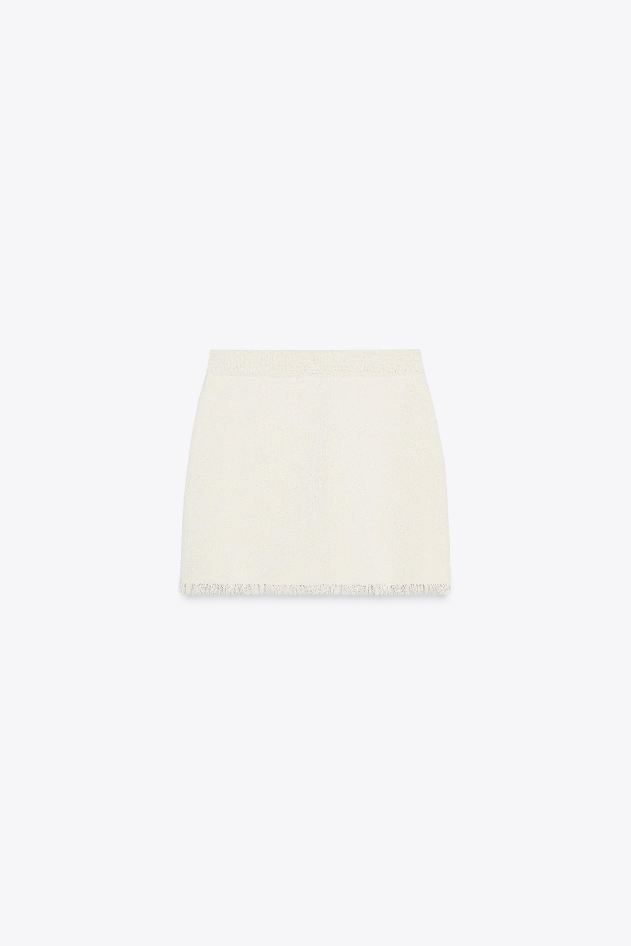FRAYED KNIT MINI SKIRT